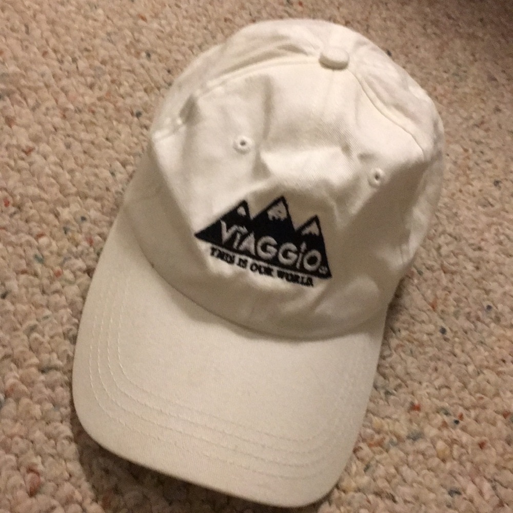 A white and black Viaggio Baseball Hat